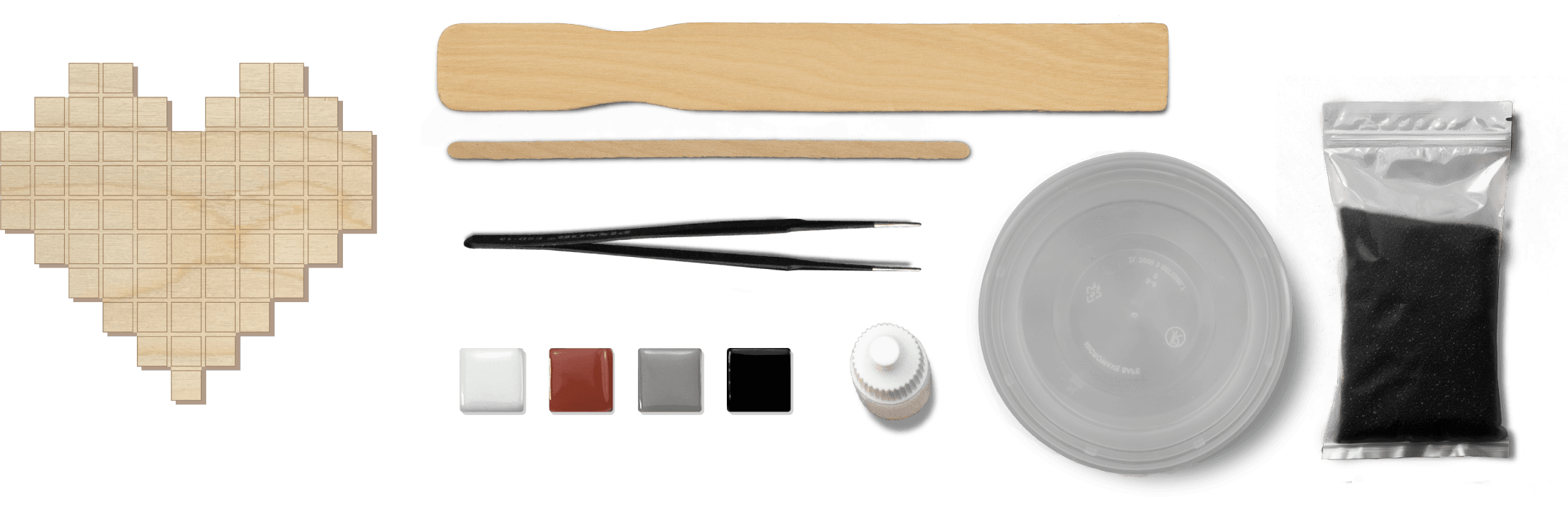Mosaic tools and materials laid out in a row.